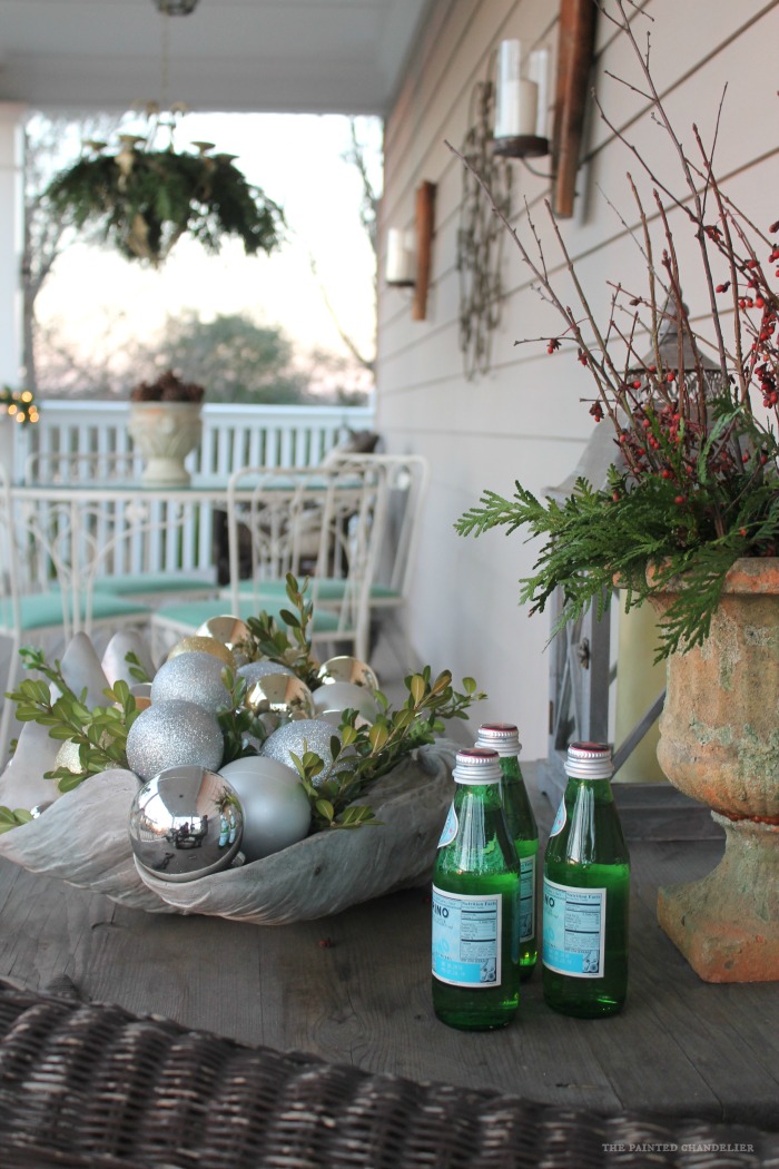 long-shot-porch-closeup-greenery-and-berries-pellegrino-bottles
